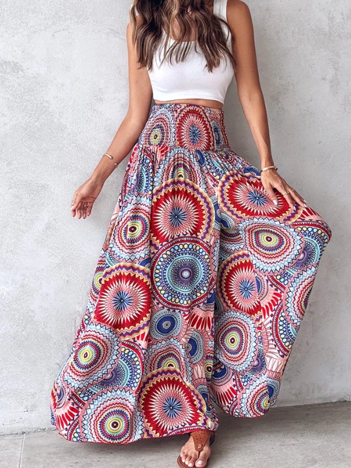 Printed wide-leg pants from Plush Fashion Hub featuring a colorful, flowy design ideal for casual and stylish outfits.