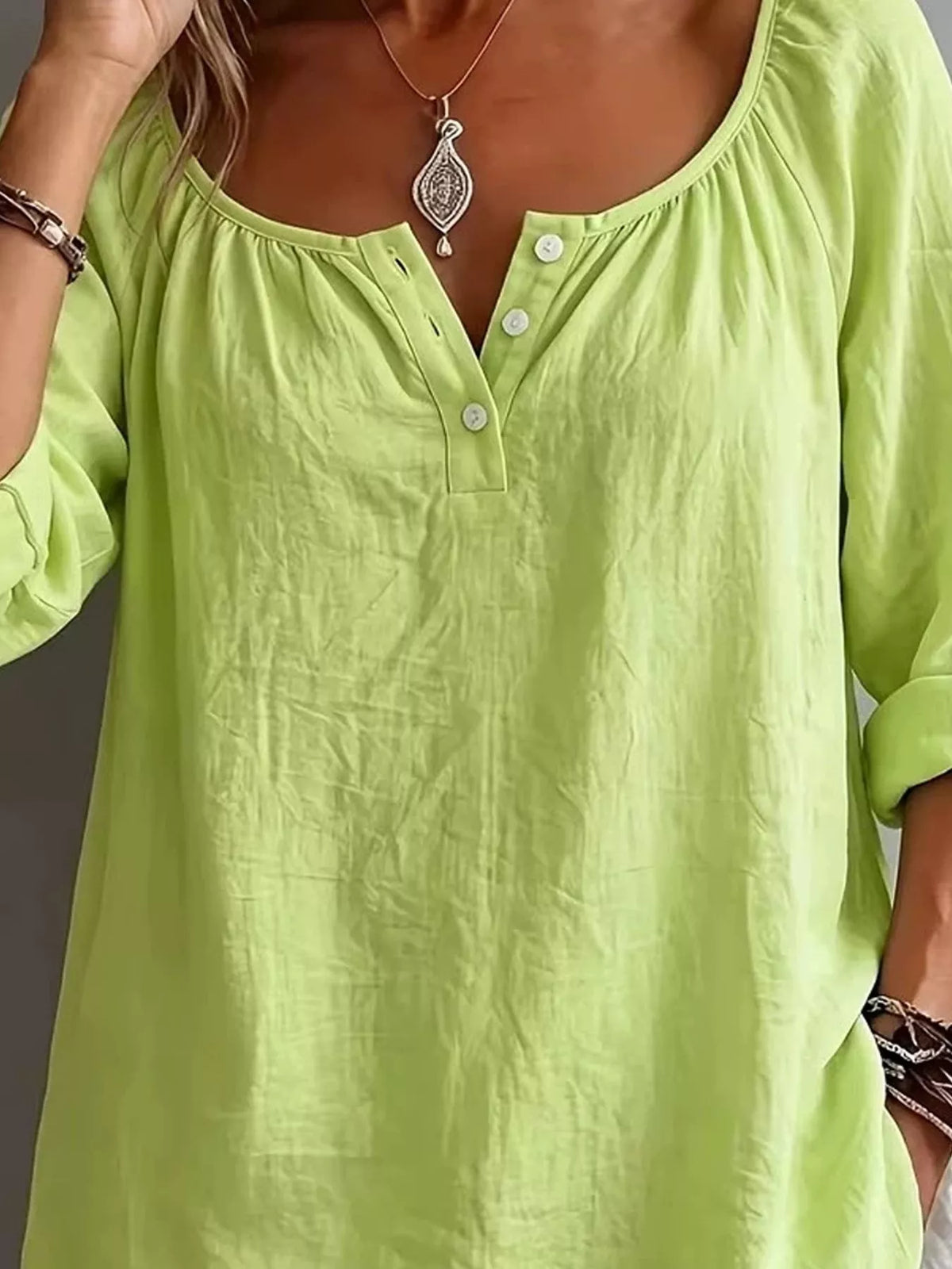 Plush Fashion Hub long sleeve top with button details, soft fabric, and a stylish, comfortable fit.