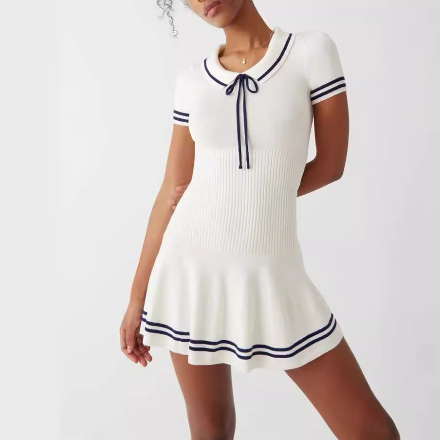 Women’s striped knit midi dress by FitiqueFit, casualwear, featuring a fitted silhouette and colorful horizontal stripe pattern.