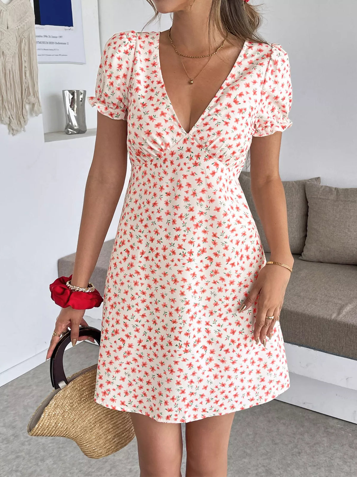 Floral print V-neck puff sleeve mini summer dress for women by Plush Fashion Hub, featuring a vibrant floral pattern and lightweight fabric.