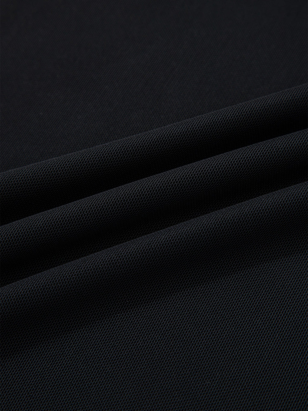Women's sheer mesh patchwork cap sleeve T-shirt by Trendsi, featuring elegant layering design and stylish ring accents.