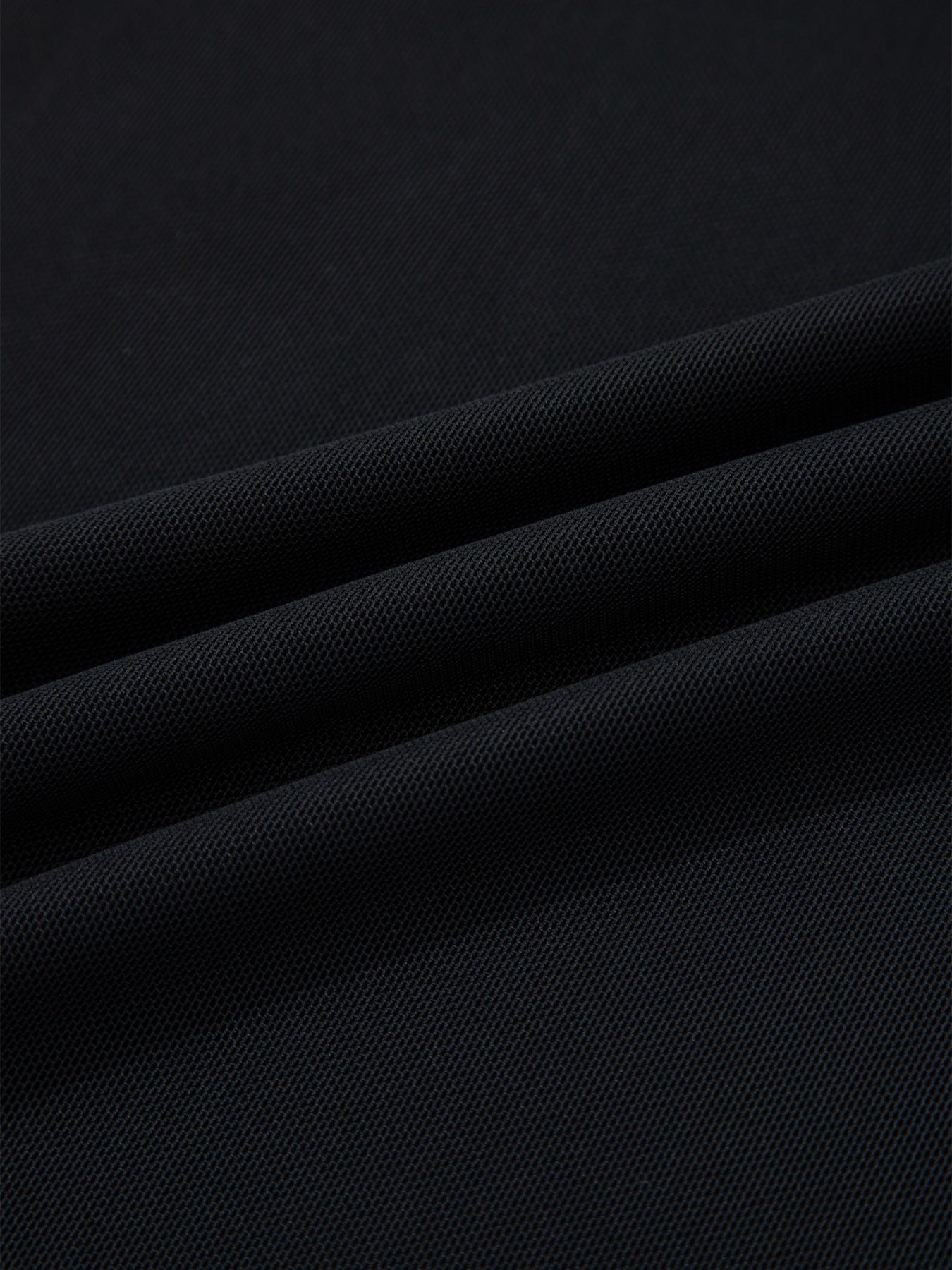 Women's sheer mesh patchwork cap sleeve T-shirt by Trendsi, featuring elegant layering design and stylish ring accents.