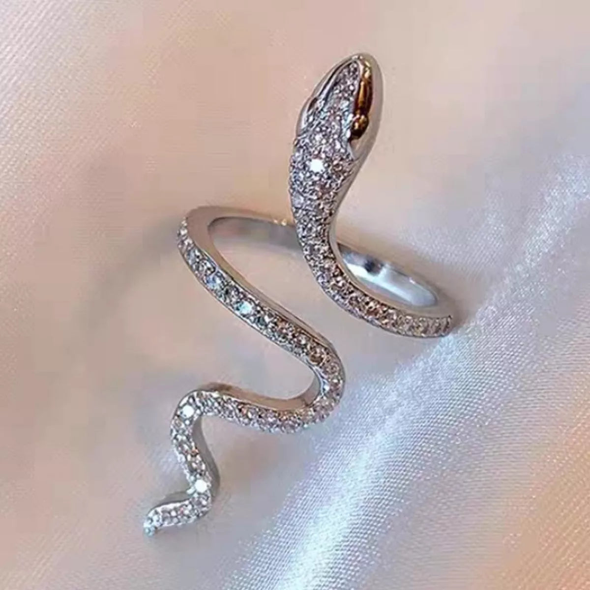 925 sterling silver zircon snake bypass ring with intricate design, featuring sparkling zircon stones and a sleek, modern style.