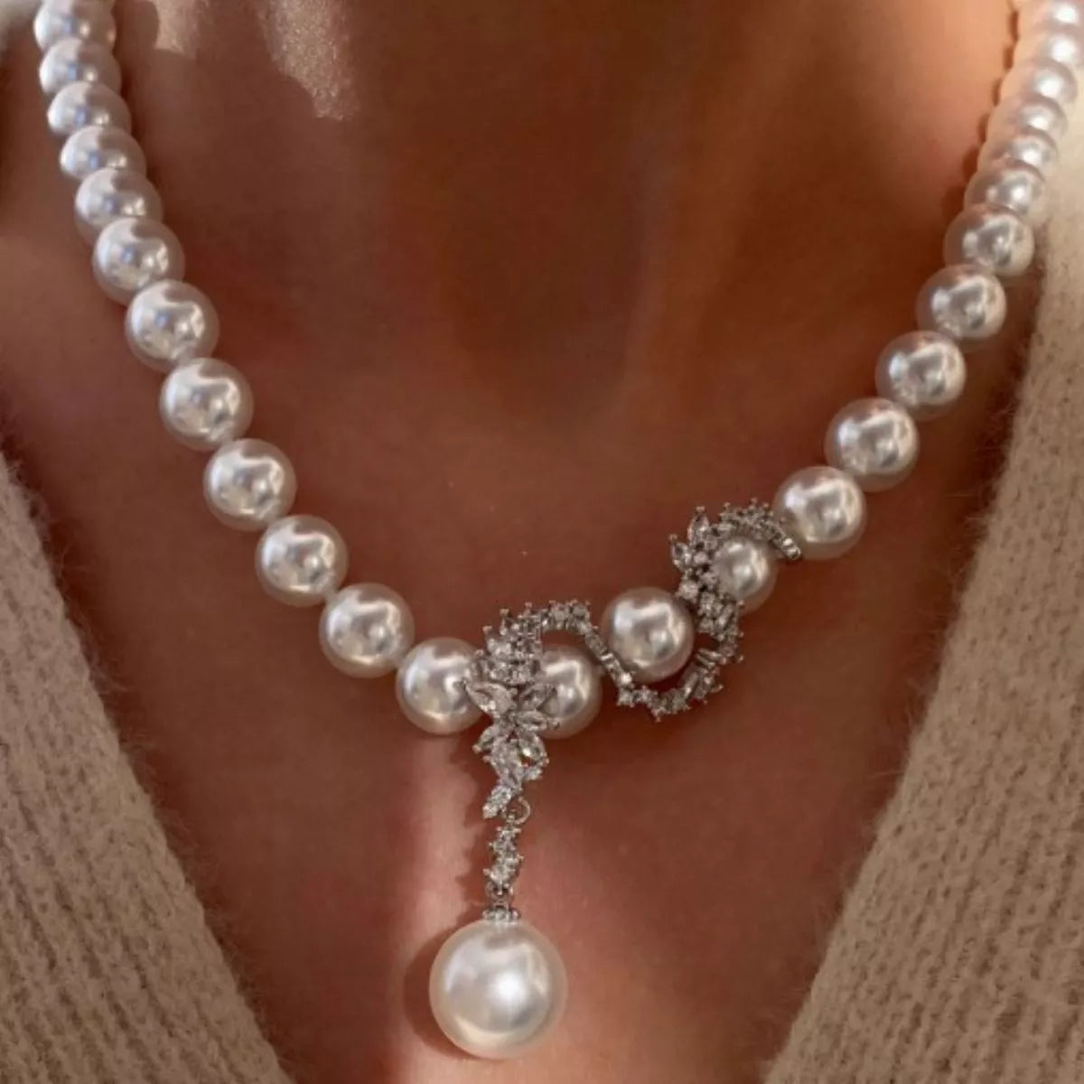 Elegant zircon pearl necklace showcasing lustrous pearls and sparkling zircon accents, crafted by Plush Fashion Hub.