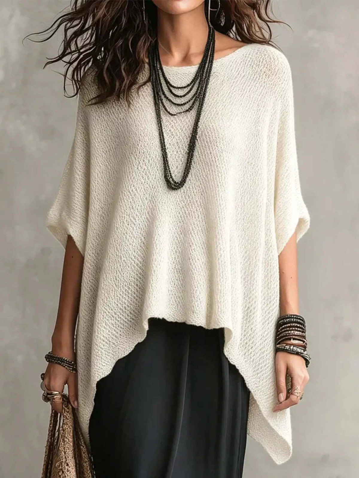 Plush Fashion Hub full size loose knit round neck top in plus size, soft and comfortable women's knit top with a relaxed fit.
