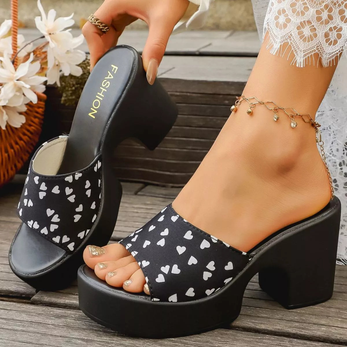 Heart print plush fashion hub block heel sandals with open toes and ankle straps, featuring a stylish heart pattern on the heels.