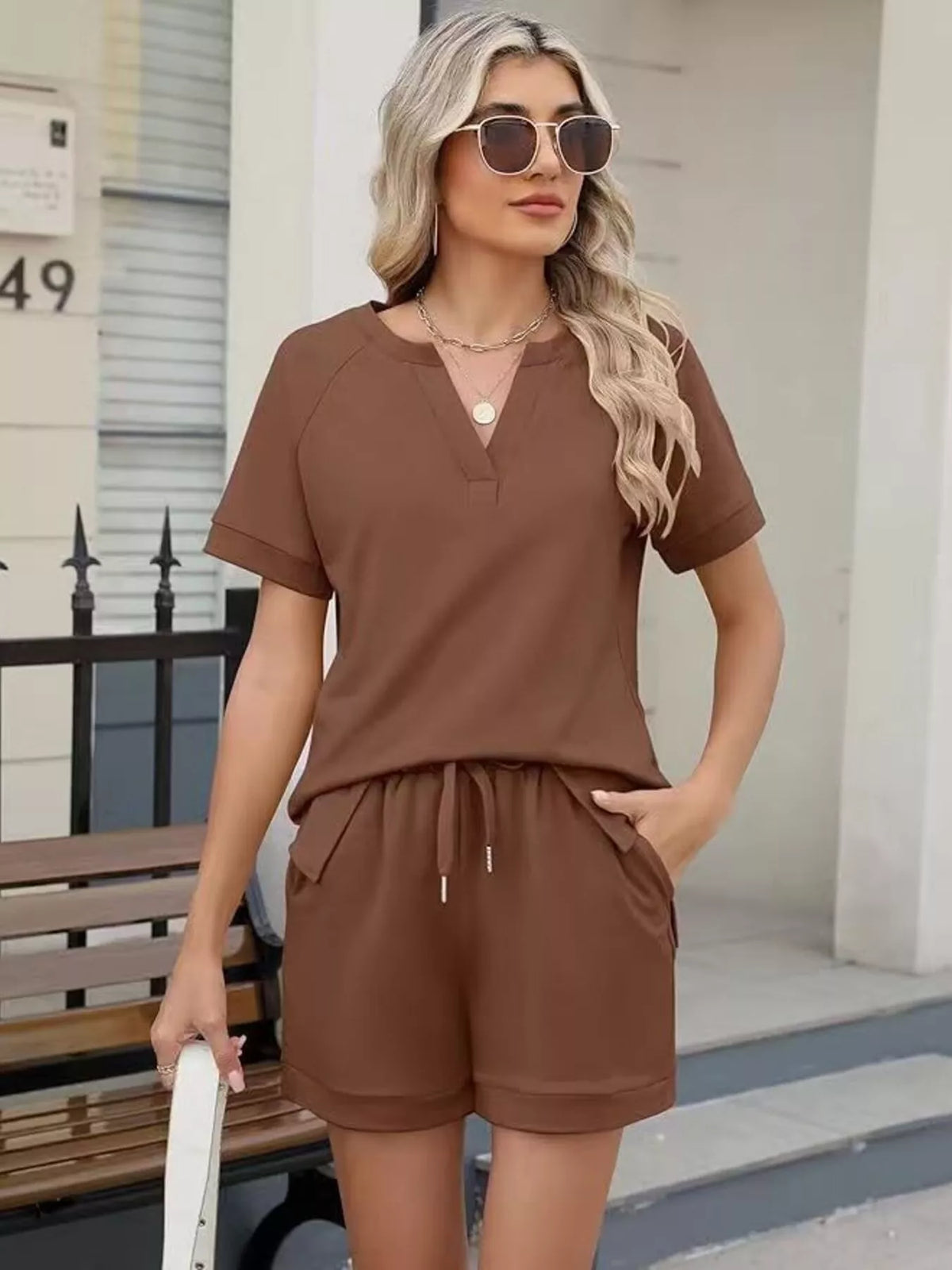 Solid color short sleeve top and shorts two-piece set by Plush Fashion Hub, casual summer apparel for women.