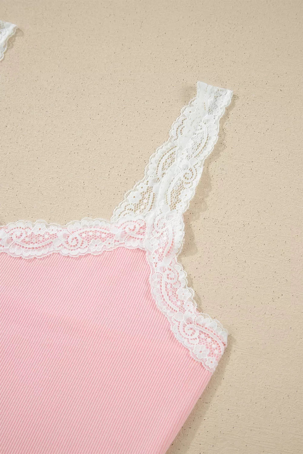 Ribbed knit lace straps patchwork crop top with floral pattern, lettuce hem, paired with matching lounge shorts in a floral short set.