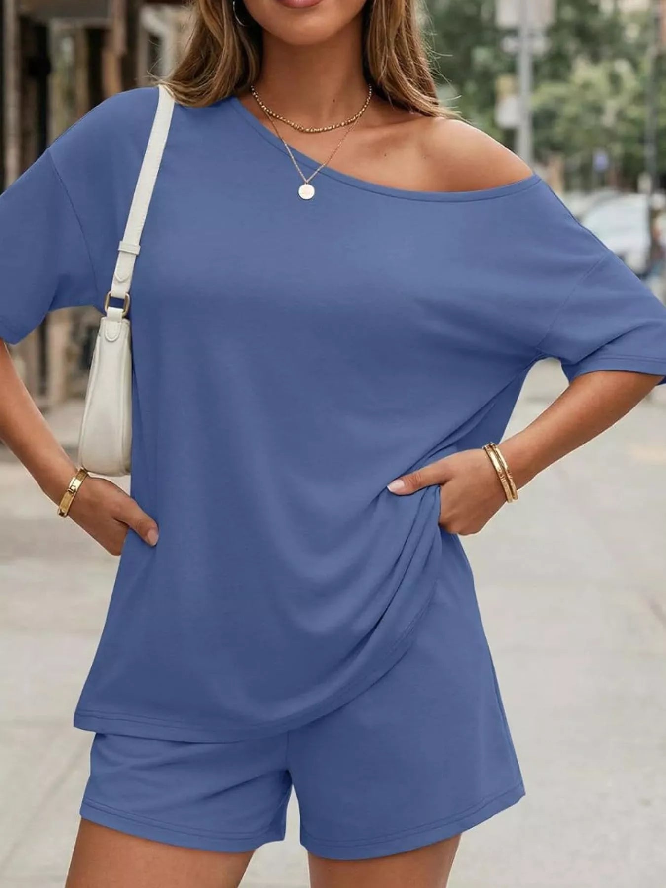 Plus size Trendsi one-shoulder top and shorts set, featuring a stylish off-shoulder design and comfortable fit.