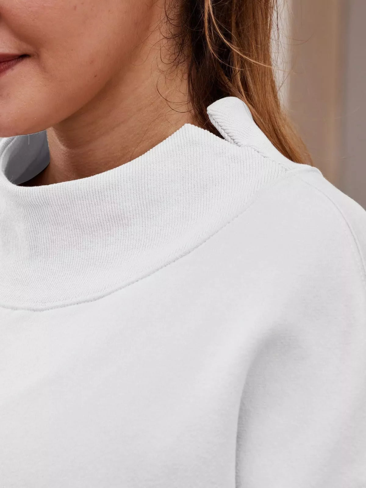 Women's oversized plush fashion hub sweatshirt with mock neck, dropped shoulders, casual fit, in soft fabric, front view.