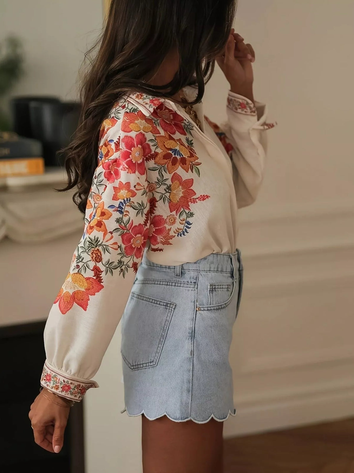 Floral print button-up shirt by Plush Fashion Hub featuring a vibrant floral pattern and classic collar design.