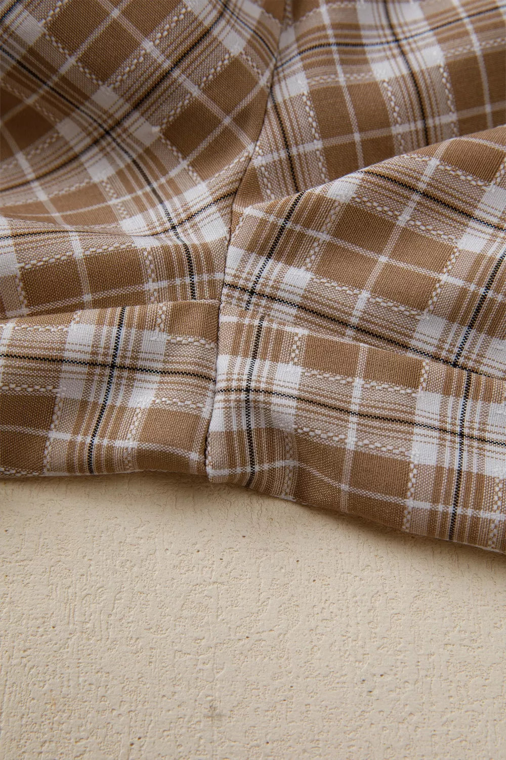 Casual plaid print pants with tie detail from Trendsi, featuring a relaxed fit and stylish design.