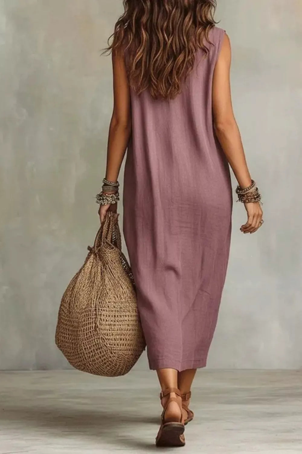 Sleeveless drape neck midi dress by Plush Fashion Hub, featuring a flowy silhouette and elegant design, shown in the product image.