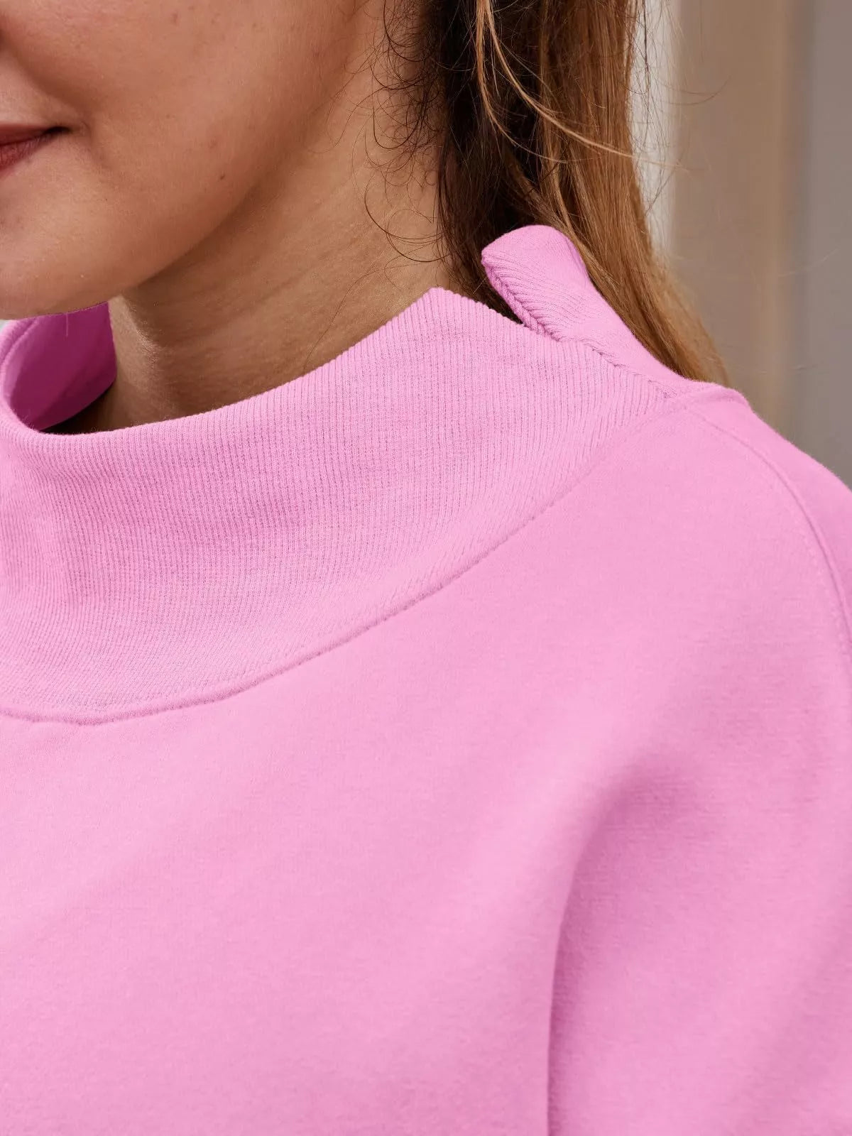 Women’s oversized casual pullover sweatshirt with mock neck and dropped shoulders in soft fabric by Plush Fashion Hub.