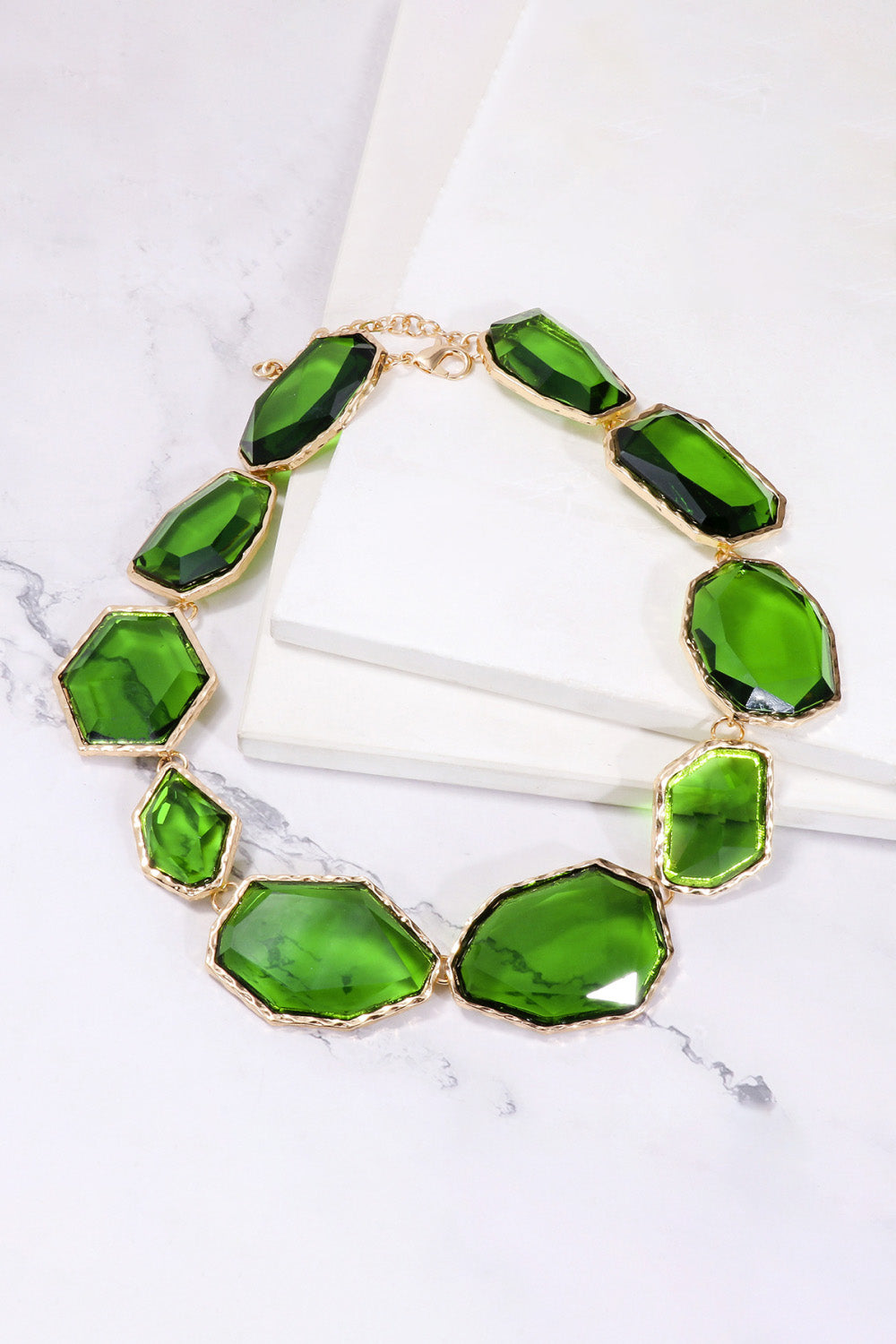 Geometrical shape resin necklace with zinc alloy frame, stylish jewelry piece from Plush Fashion Hub showing intricate design and craftsmanship.
