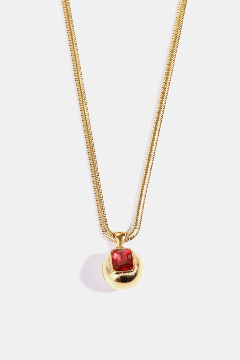 18K gold-plated geometrical zircon pendant necklace with modern design, featuring sparkling zircon stones on a sleek chain.