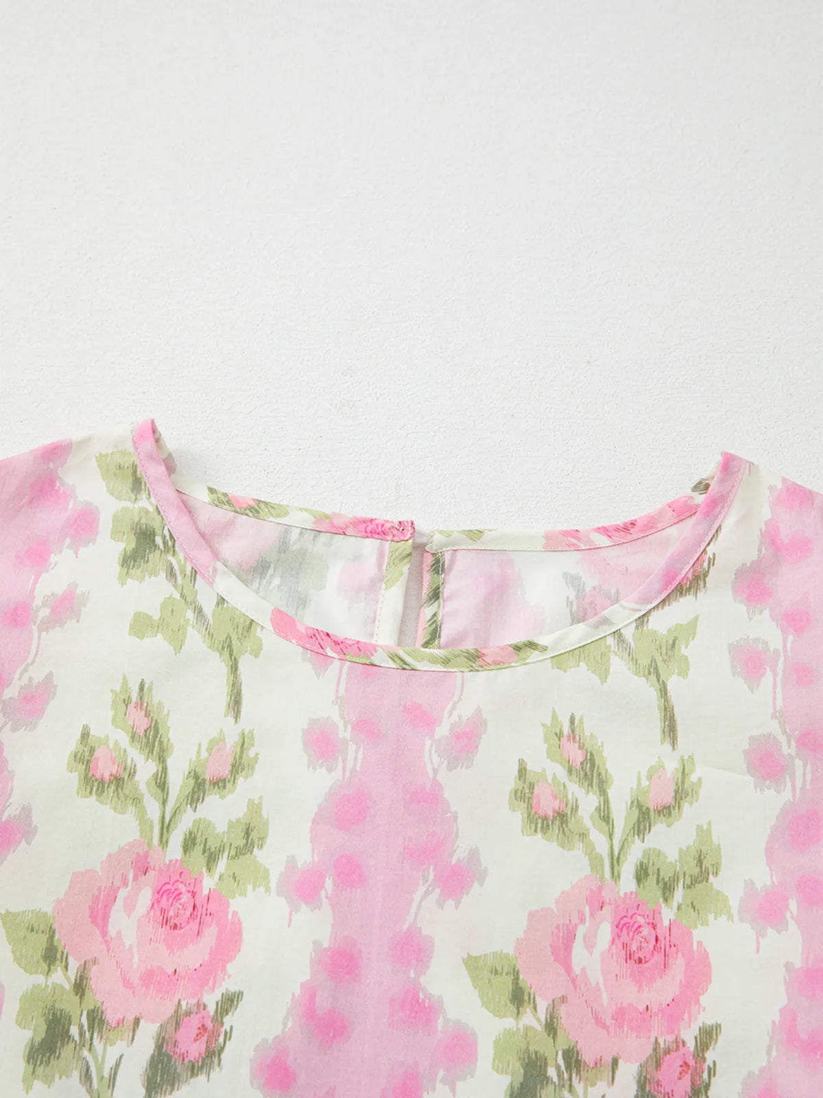 Floral print ruffled sleeve blouse by Plush Fashion Hub featuring a feminine design and lightweight fabric.