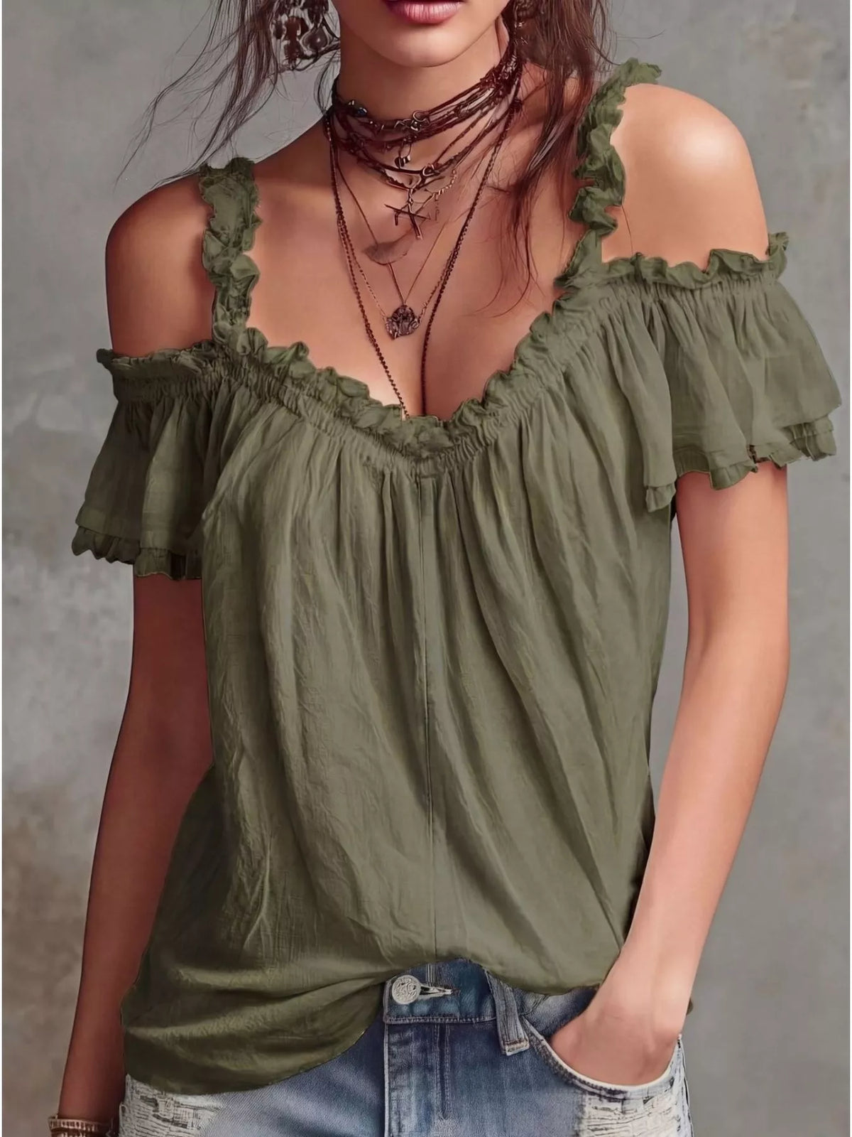 Plush Fashion Hub frill cold shoulder blouse featuring ruffled sleeves and lightweight fabric, styled on a model.