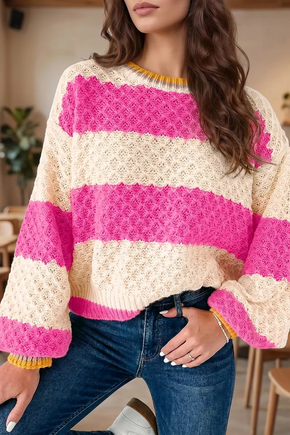 Women's striped colorblock textured drop shoulder sweater by Trendsi, featuring bold stripes and cozy knit fabric.