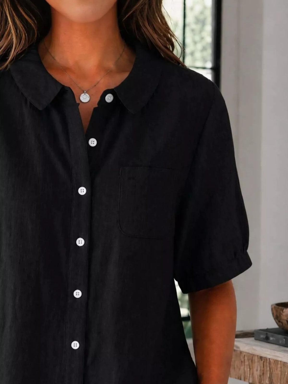 Plus size short sleeve button-up shirt from Trendsi, casual tops with a relaxed fit and classic collar, shown in the image.