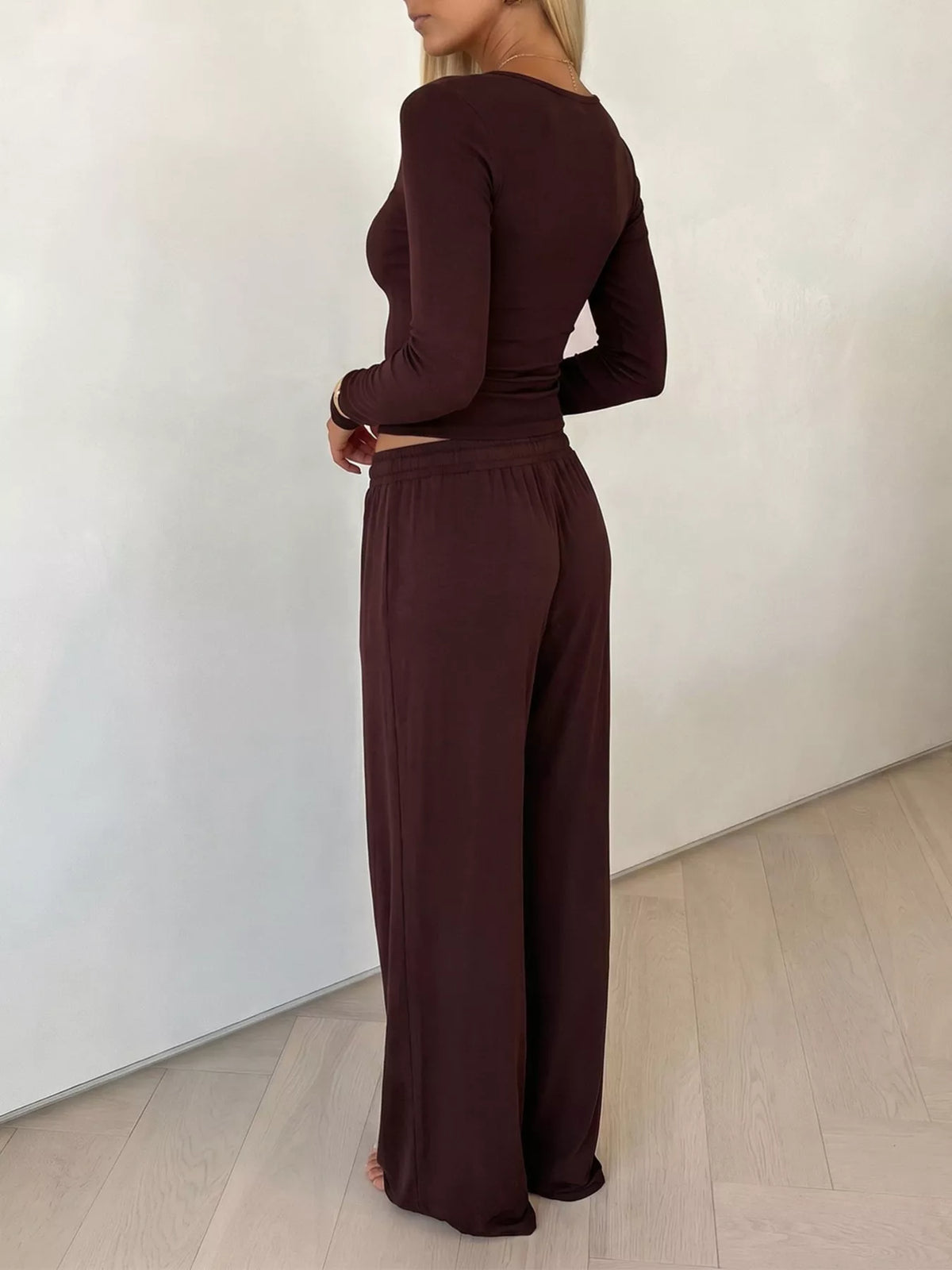 Plush Fashion Hub matching set with V-neck long sleeve top and wide-leg pants, soft fabric, stylish and comfortable for casual wear.