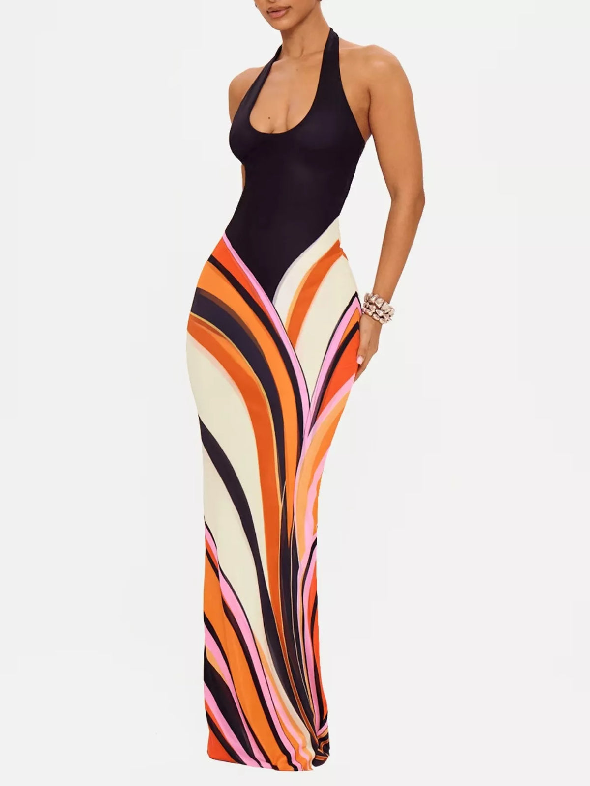 Halter neck maxi dress with abstract print from Plush Fashion Hub, flowing fabric and stylish design for elegant summer wear.