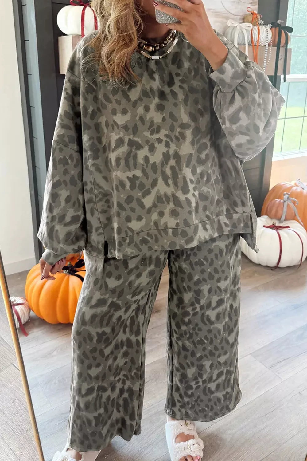 Leopard print long sleeve top and pants matching set by Trendsi, featuring a stylish animal print design.