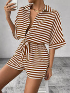 Striped button-front half sleeve romper shirt by Plush Fashion Hub, casual style with front buttons and a relaxed fit.