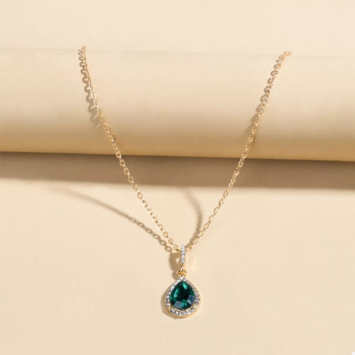 18K gold-plated teardrop pendant necklace with sleek design, featuring a delicate chain and elegant teardrop charm.