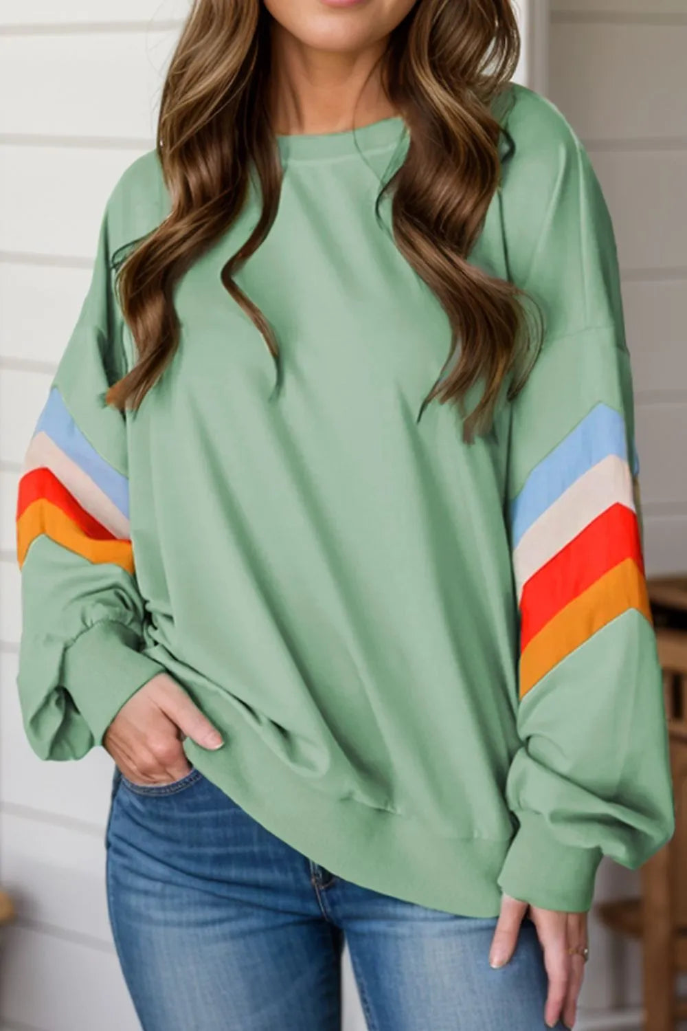 Contrast round neck long sleeve sweatshirt from Plush Fashion Hub, featuring a stylish design and comfortable fit.