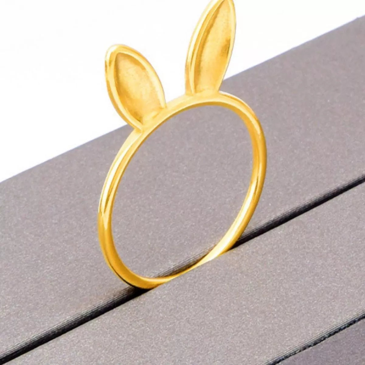 Gold-plated bunny ear ring from Plush Fashion Hub, showcasing a cute, detailed design with a shiny finish on a plain background.