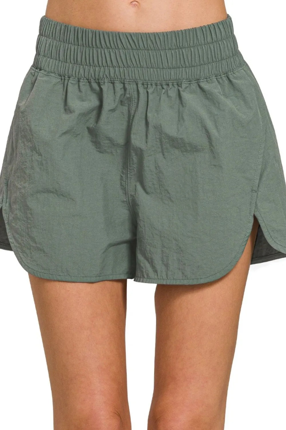 Zenana active wear windbreaker running shorts with smocked waistband, lightweight and comfortable for athletic activities.
