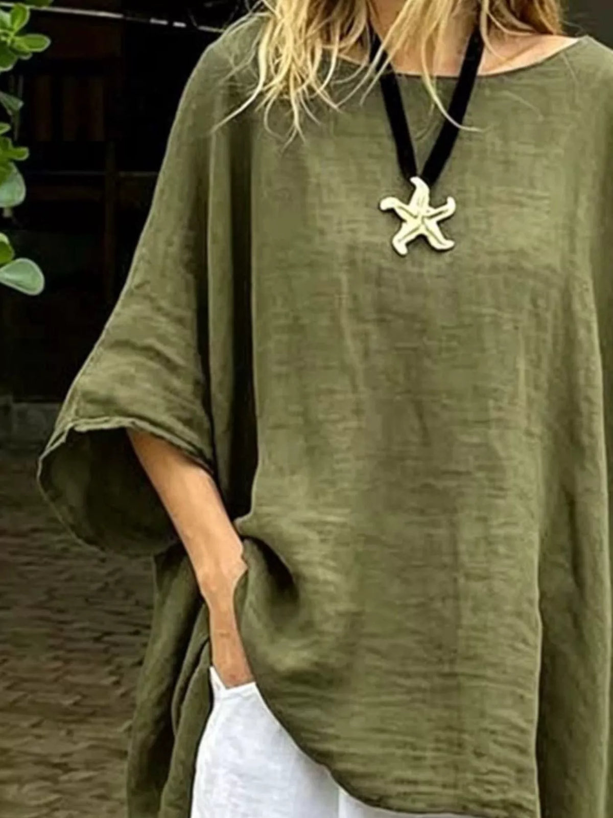 Plus size loose fit asymmetrical hem tunic top by Plush Fashion Hub, featuring a relaxed silhouette and stylish design.
