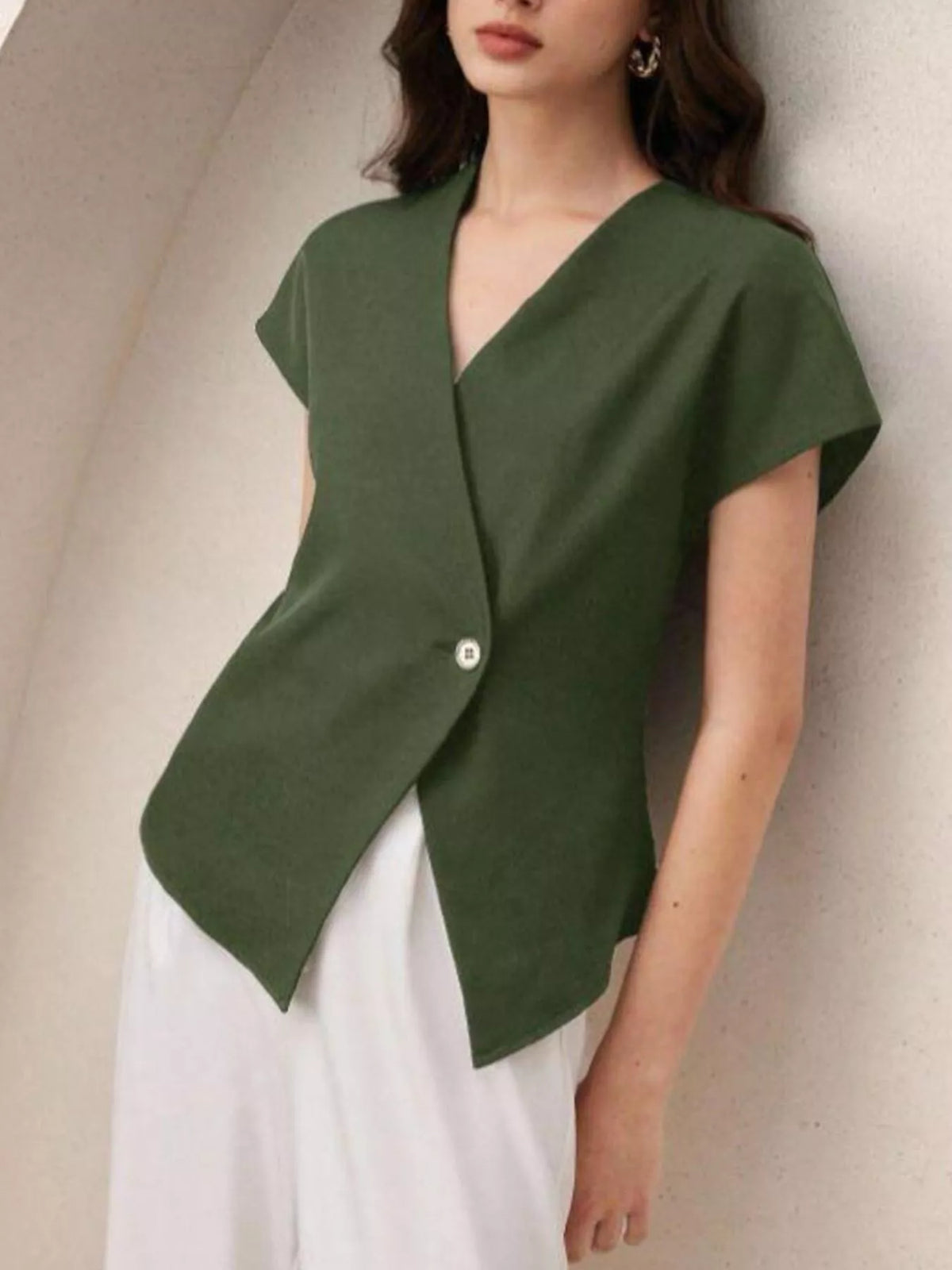 Plush Fashion Hub wrap-front one-button shirt in soft fabric, featuring a stylish wrap design and a single front button.