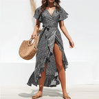 Women's summer floral high-waist V-neck chiffon dress in light, flowy fabric with a feminine floral pattern.