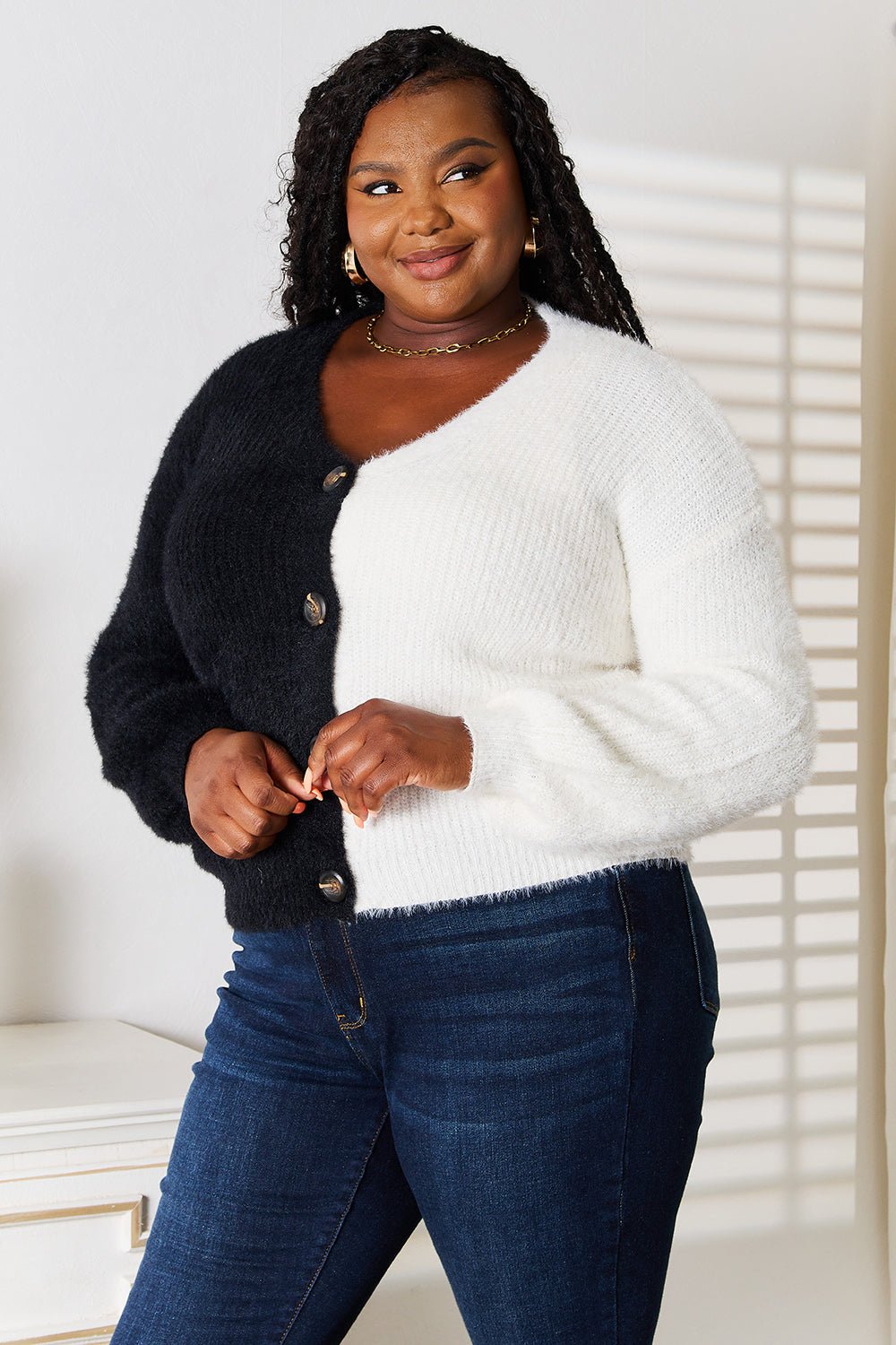 Women’s contrast button-front V-neck knit cardigan by Plush Fashion Hub with angel wing woven design details.