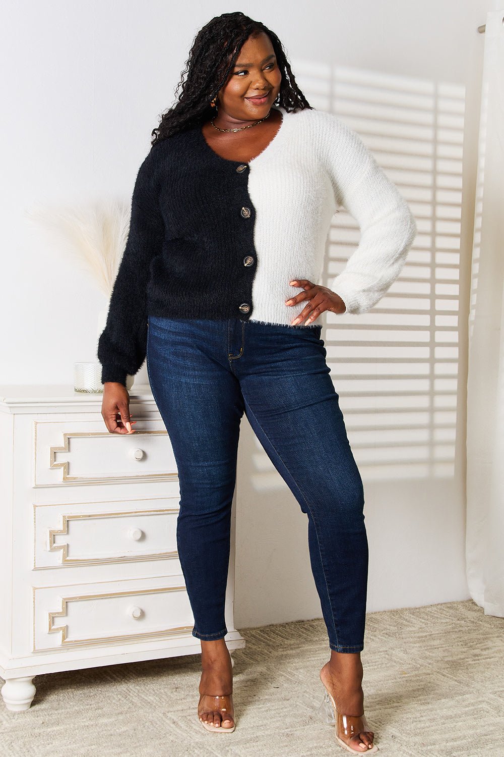 Women’s contrast button-front V-neck knit cardigan by Plush Fashion Hub with angel wing woven detail on the right.