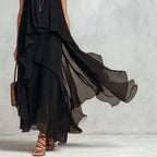 Black asymmetrical ruffle mesh chiffon sleeveless maxi dress by FitiqueFit, available in XS to XXL for casual wear.