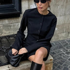 Elegant long blazer dress for women by Bella Mia featuring a round neckline, long sleeves, slim fit, and waist-tight A-line design.