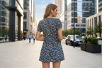Women's slim-fit lace-up waist mini dress by FitiqueFit featuring a V-neck, short sleeves, and floral print for casual wear.
