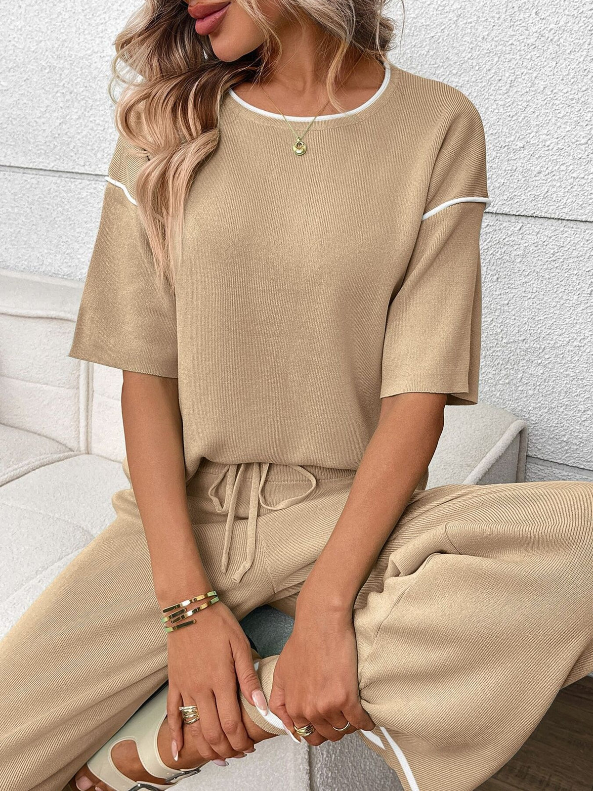 Women’s casual two-piece lounge set with round neck top and drawstring pants by Plush Fashion Hub, comfortable and stylish.