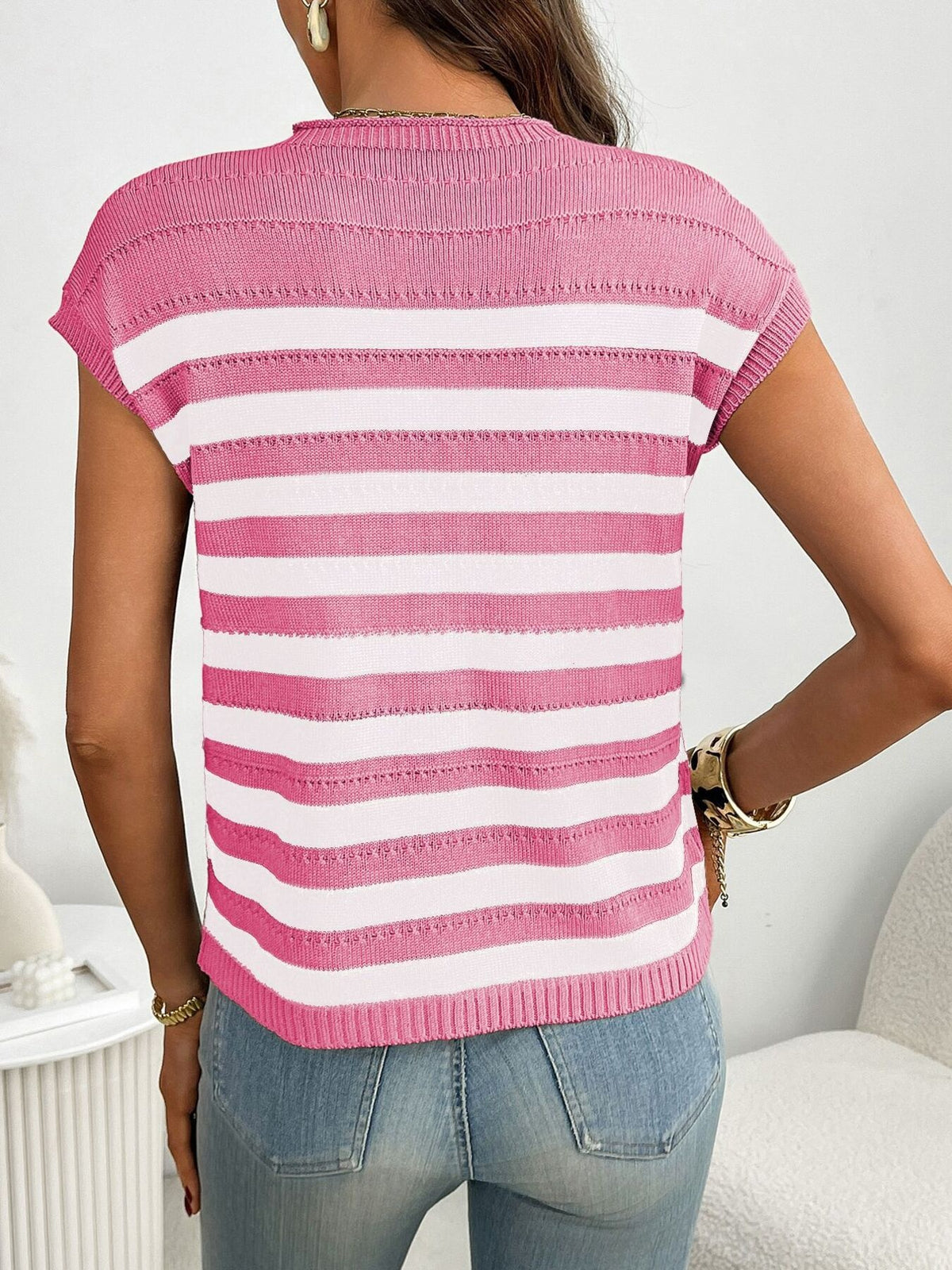 Women’s striped knit cap sleeve sweater with pocket detail, soft and stylish outerwear by Plush Fashion Hub