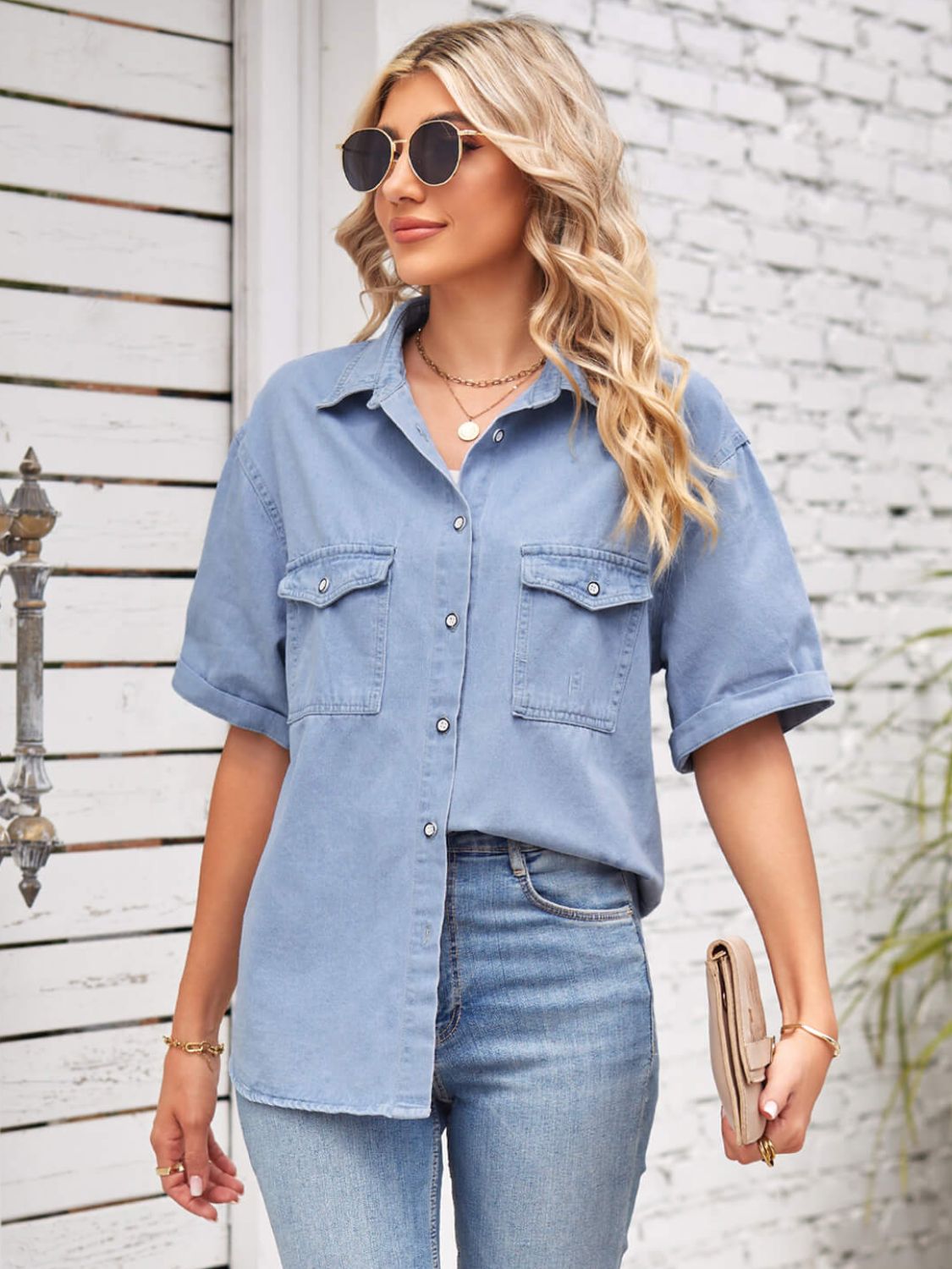 Plush Fashion Hub denim short sleeve collared jacket hanging on a hanger, casual fashion piece with button details and classic blue denim.