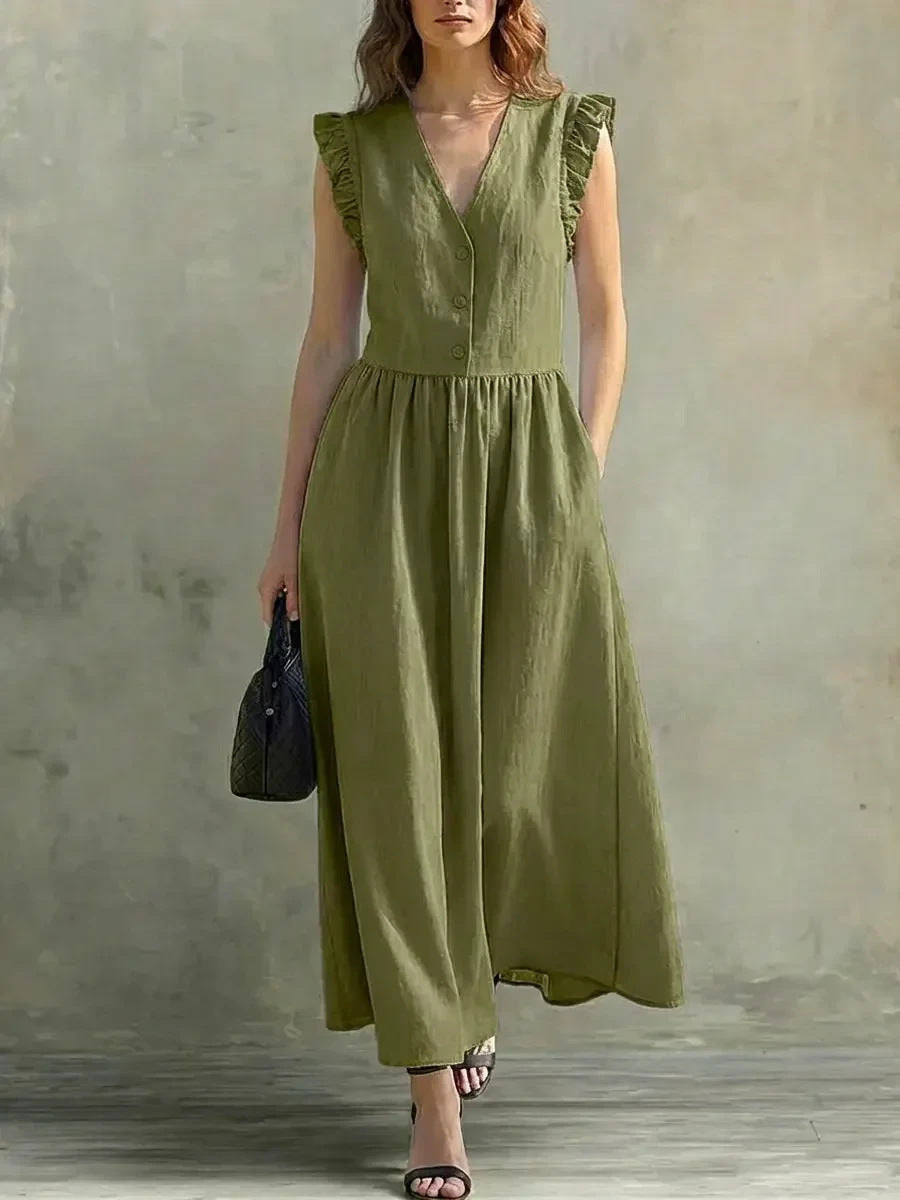 Light blue V-neck puff-sleeve dress with pockets, made of cotton linen, casualwear by FitiqueFit, shown on model.
