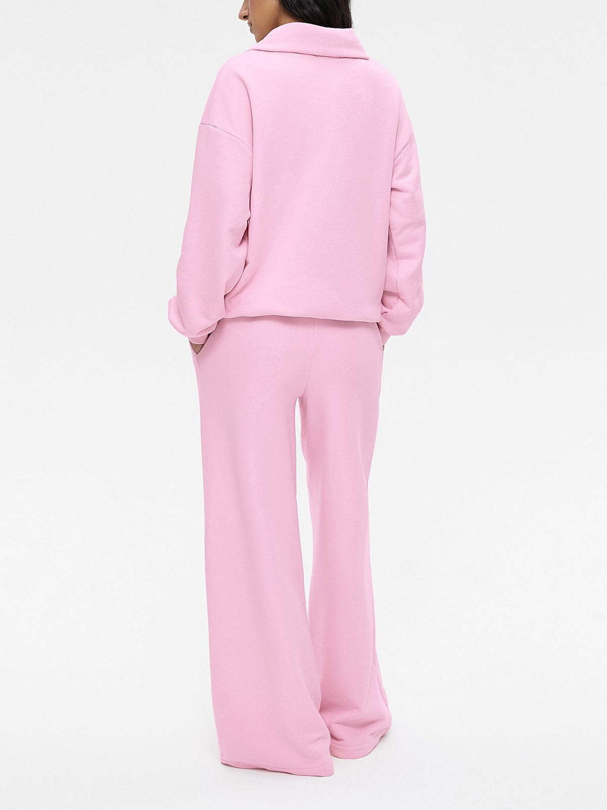 Women's quarter zip long sleeve loungewear set in a plush fashion hub two-piece tracksuit, featuring comfortable relaxed fit and soft fabric.