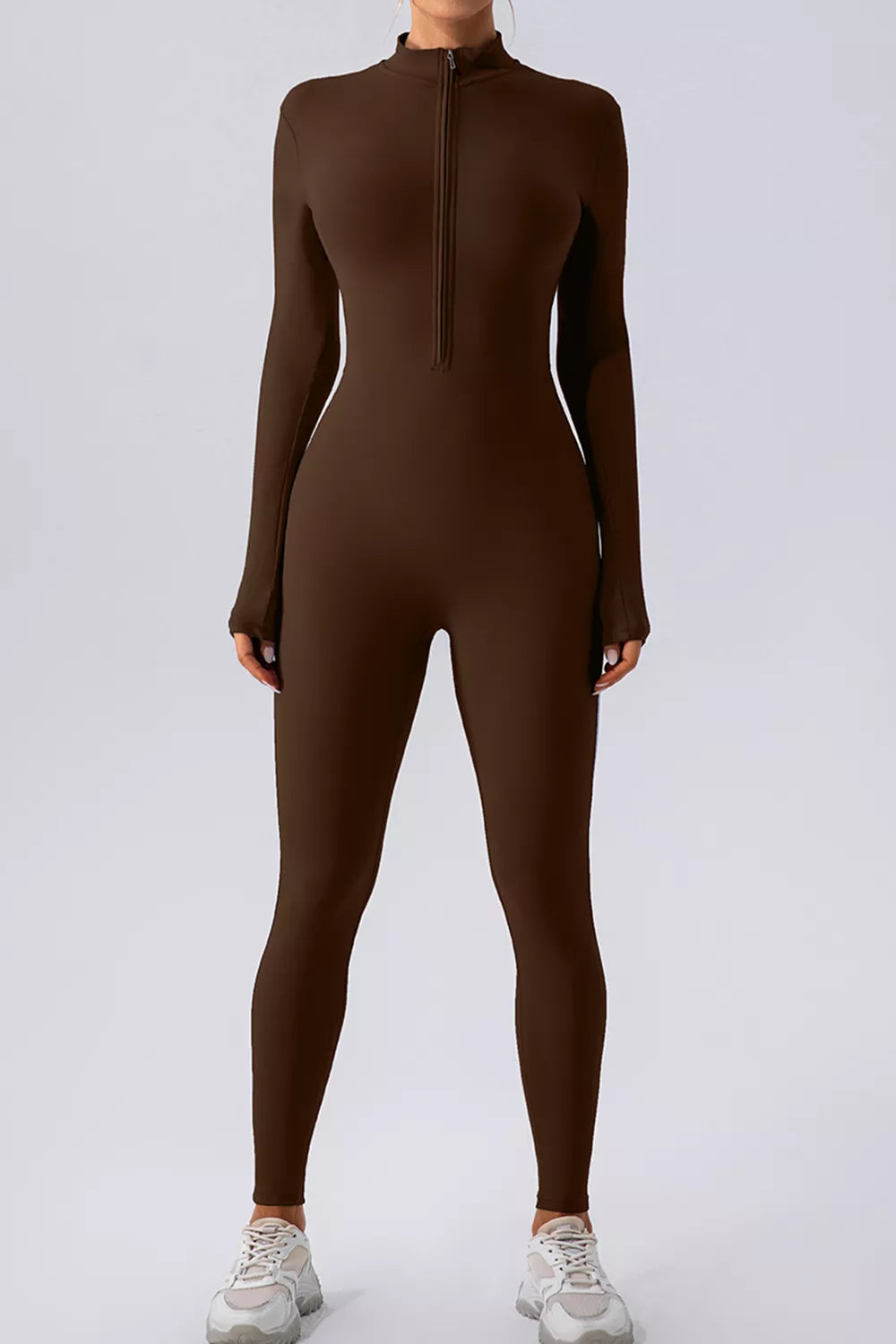 Plush Fashion Hub half zip mock neck active jumpsuit in black, featuring a fitted design and breathable fabric for workout or casual wear.