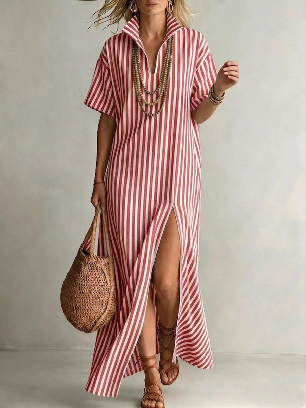 Striped high slit maxi shirt dress by Plush Fashion Hub featuring a flowy silhouette and bold vertical stripes.
