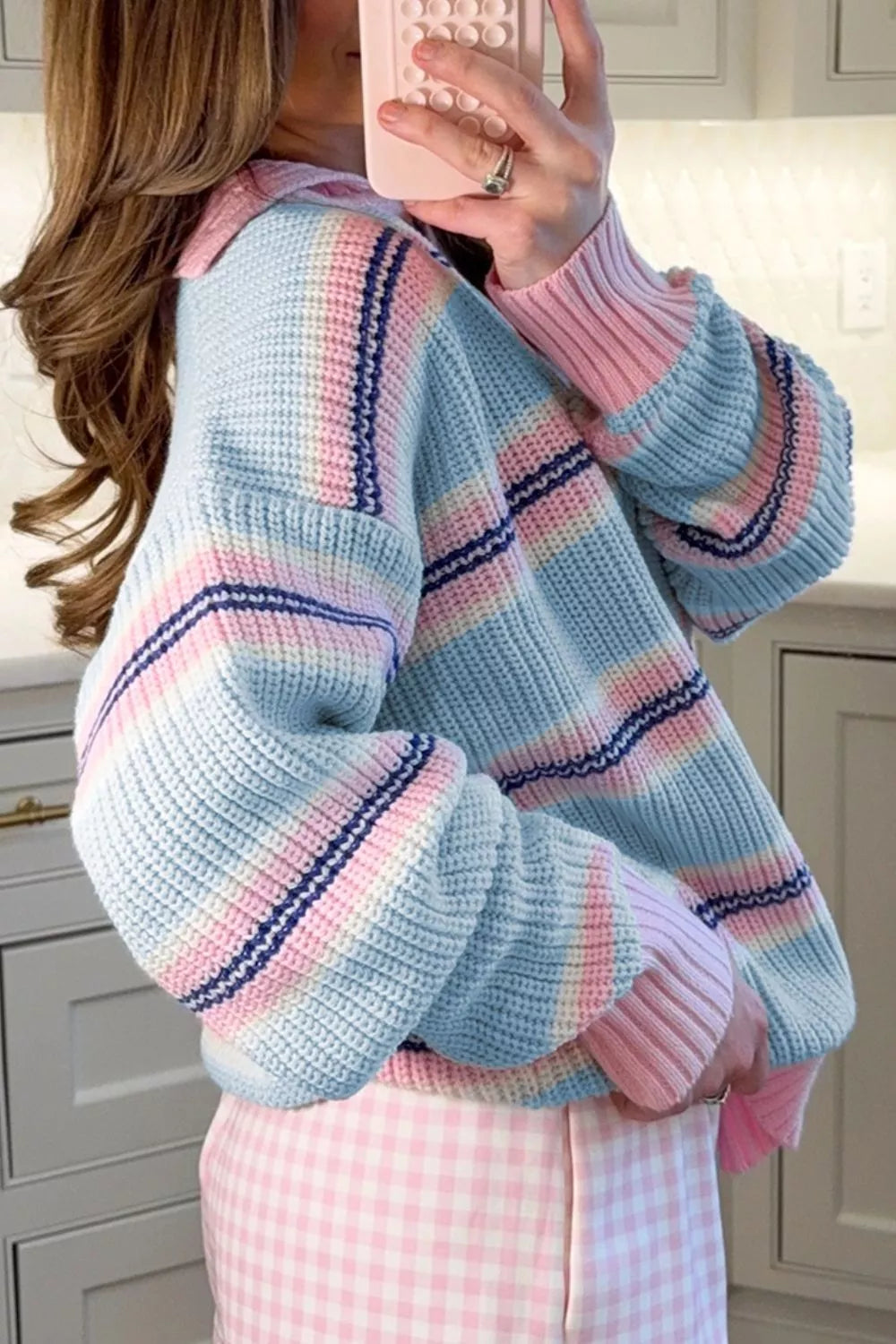 Striped button collar long sleeve knitwear sweater by Trendsi, featuring a cozy design with vertical stripes and a classic collar.