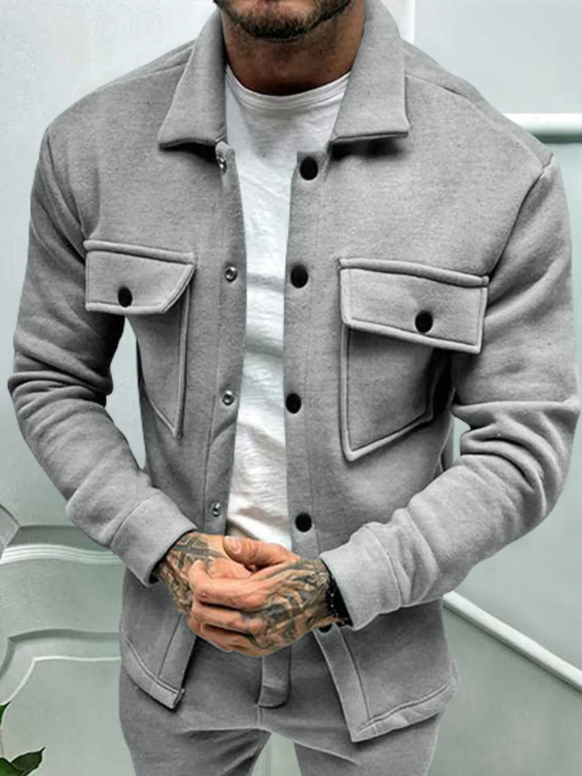 Men's plus size button-up long sleeve jacket by Trendsi, showing the full front view with collar and button details.