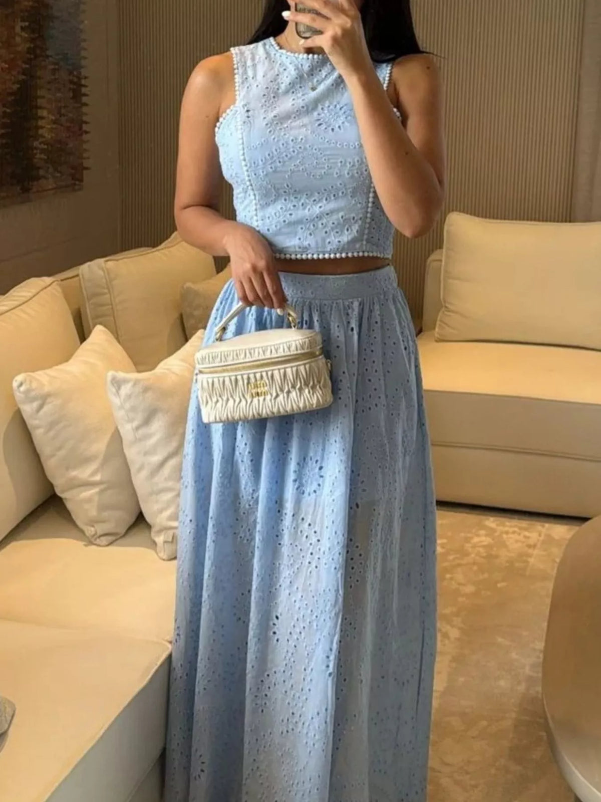 Plush Fashion Hub eyelet crop top and maxi skirt set with matching top and flowing skirt, stylish and lightweight for warm weather.